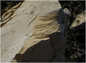 shatter cone fracturing limestone Rubielos de la Cérida impact basin Spain