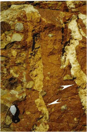 azuara impact structure, dike cutting through crater diamictite, degassing pipes