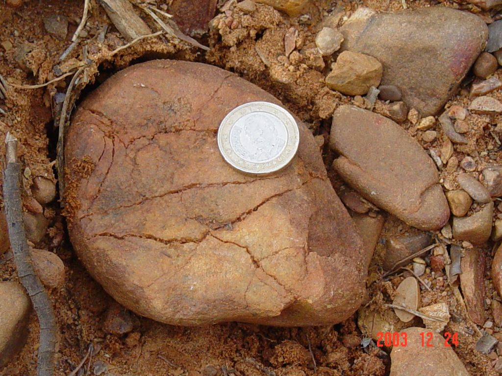 azuara impact, Pelarda formation, high-pressure squeezing of a quartzite boulder