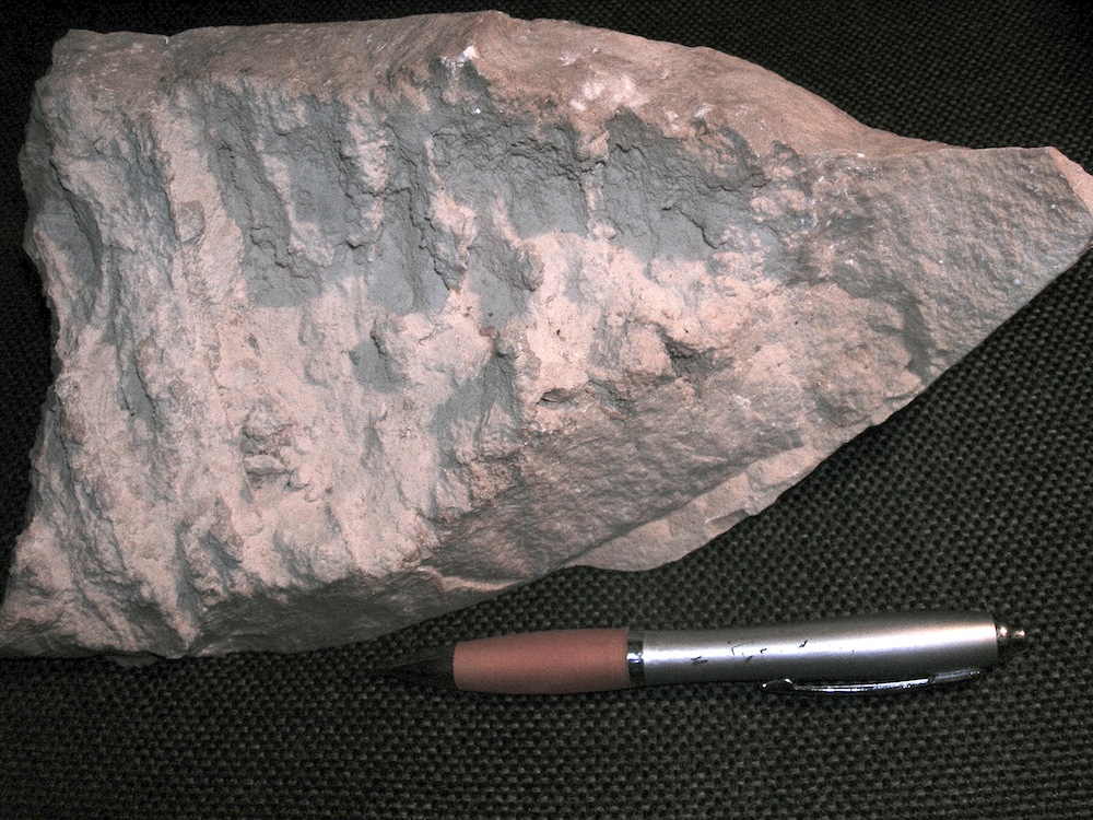 Azuara impact structure, internally decarbonized/melted carbonate boulder