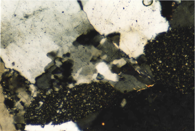 photomicrograph, shock mosaicism quartz, sandstone, Azuara impact structure