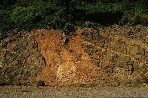 impact breccia dike in Paleozoic siltstones; road to Santuario de la Virgen de Herrera Azuara impact