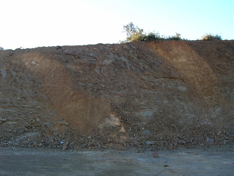 two thick impact breccia dikes cutting Paleozoic siltstones, Autovía Mudéjar Azuara impact structure