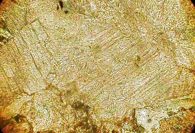 photomicrograph microtwinning in calcite Rubielos de la Cérida impact
