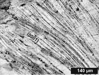 photomicrograph bent planar deformation features PDFs Charlevoix impact structure