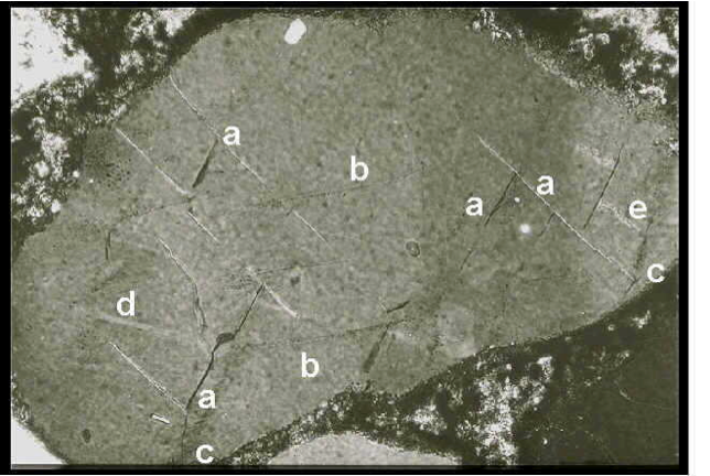 photomicrograph of planar fractures in quartz grain, Sta. Cruz breccia, Azuara shock