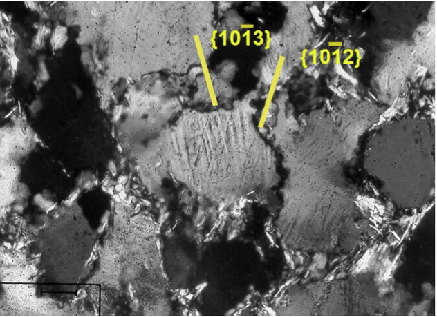 photomicrograph of planar deformation features, (1012) and (1013) in quartz, Azuara shock